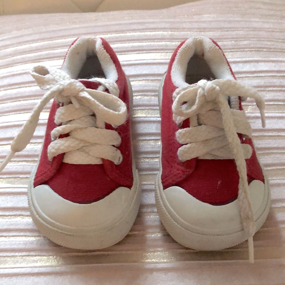 Red baby tennis shoes.